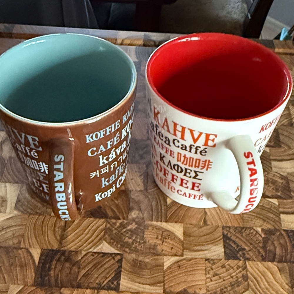 Two Starbucks Multilingual Mugs - Brown and Red